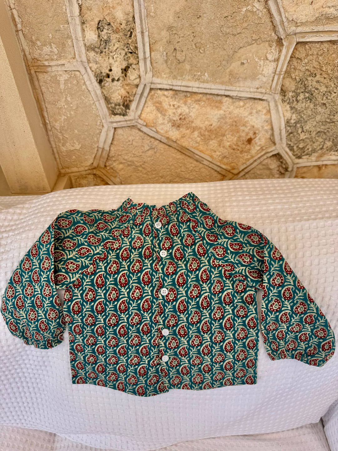 BLUSA TIRA BURDEOS